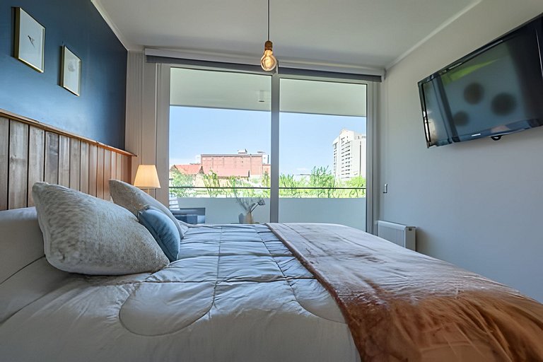 Departamento en condominio a pasos del centro.